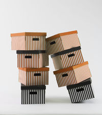 Set aus 2 gestreiften Karton-Aufbewahrungsboxen - Orange / Weiß